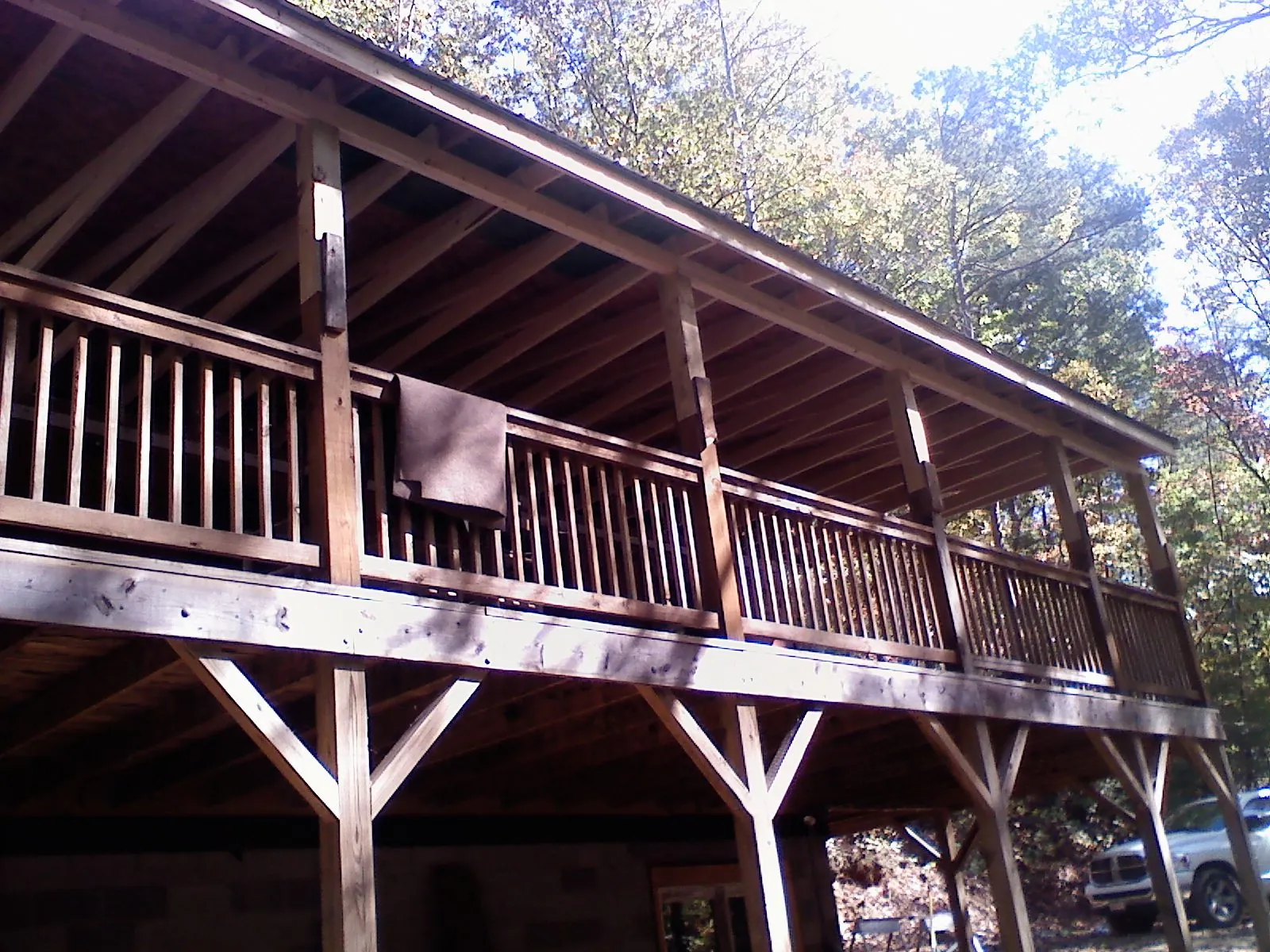 Timber framing under a new elevated porch and deck — Roof Leak Repair in Molalla by Roofing Brothers